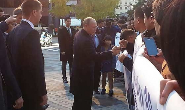 Sambo sportsmen from South Korea greeted the President of Russia Vladimir Putin