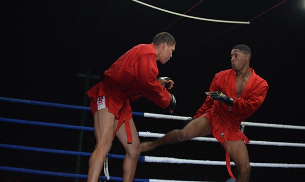 Jamaican sambists staged a demonstration fight during a boxing tournament