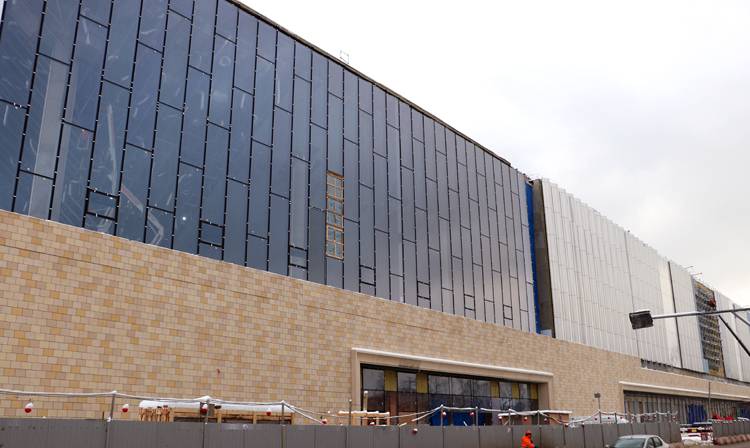 Facade work completed during the construction of the International SAMBO Center in Luzhniki